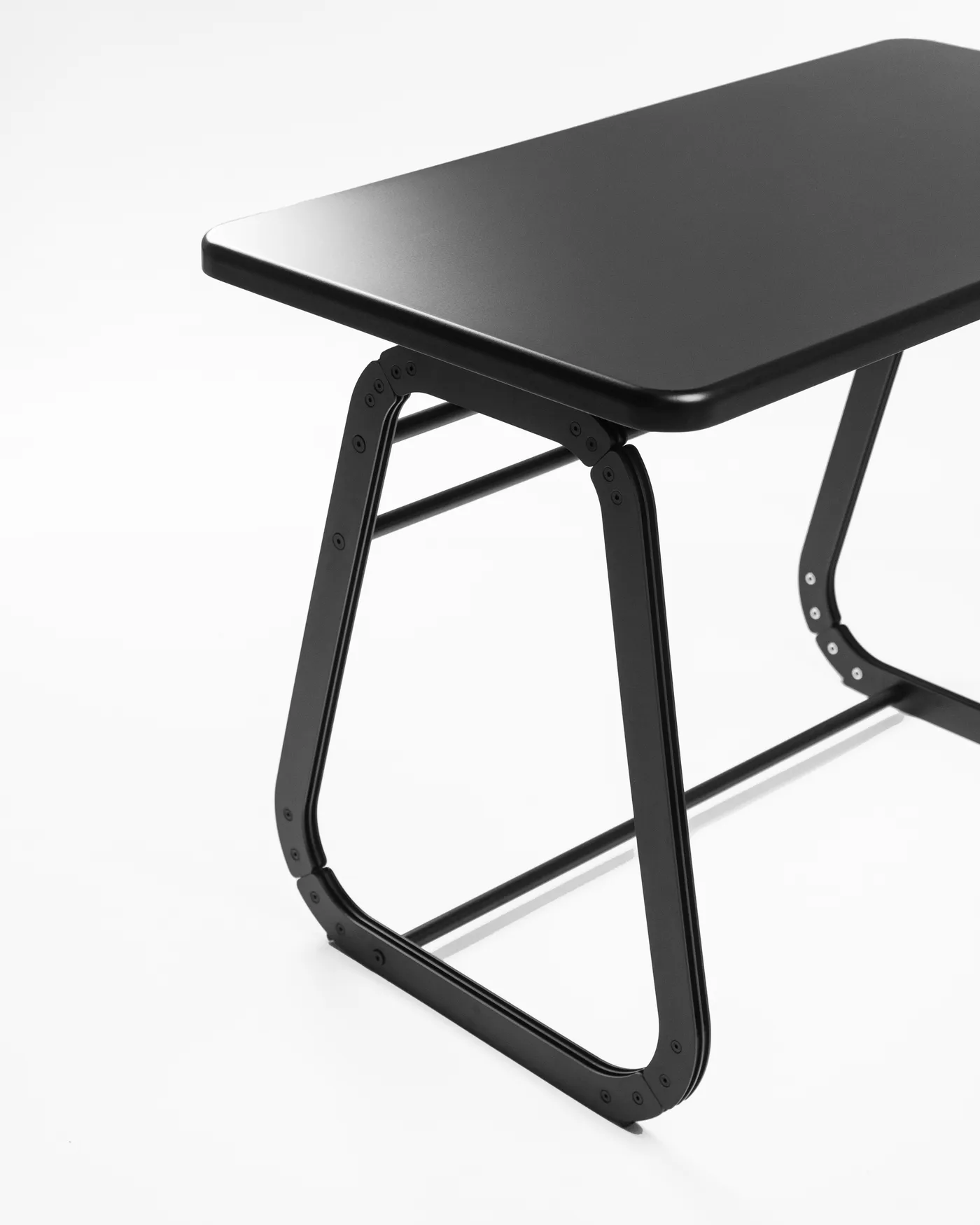 The Arte table's underside and cross-braced legs