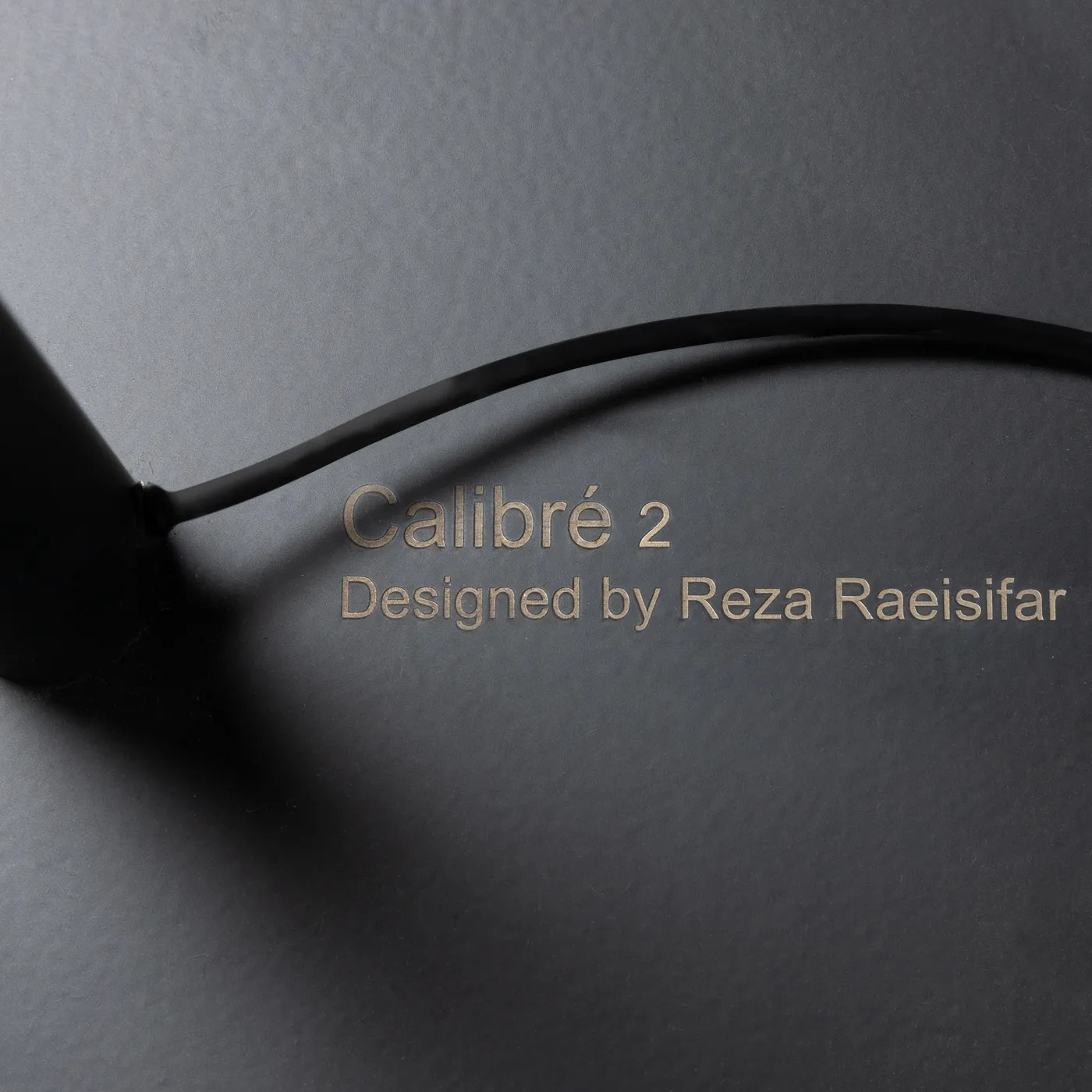Engraved detail: Calibre, designed by Reza Raeisifar