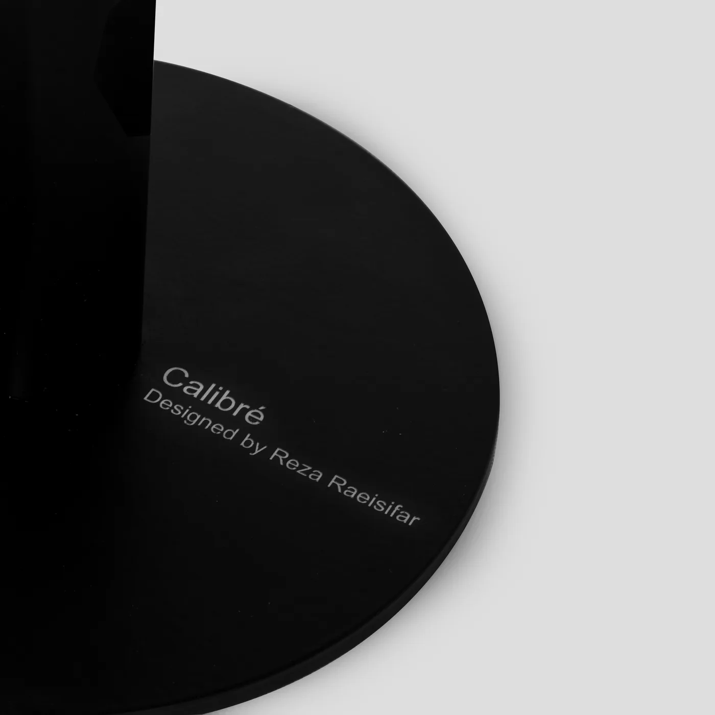 Calibre's base plate, engraved: designed by Reza Raeisifar