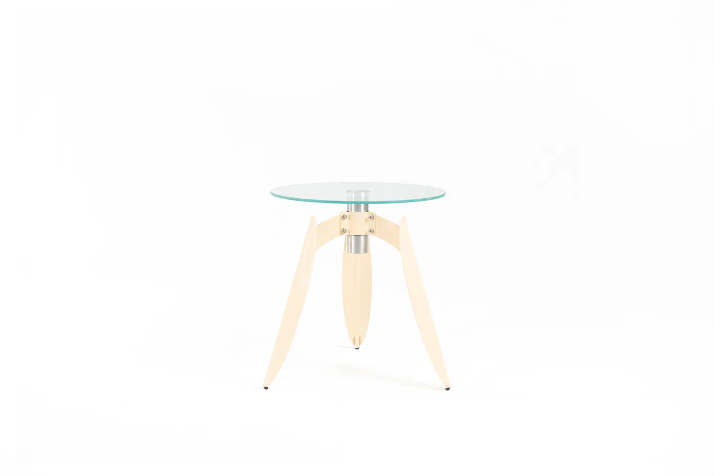 Dot table — a glass top resting on cream leaf-bent legs