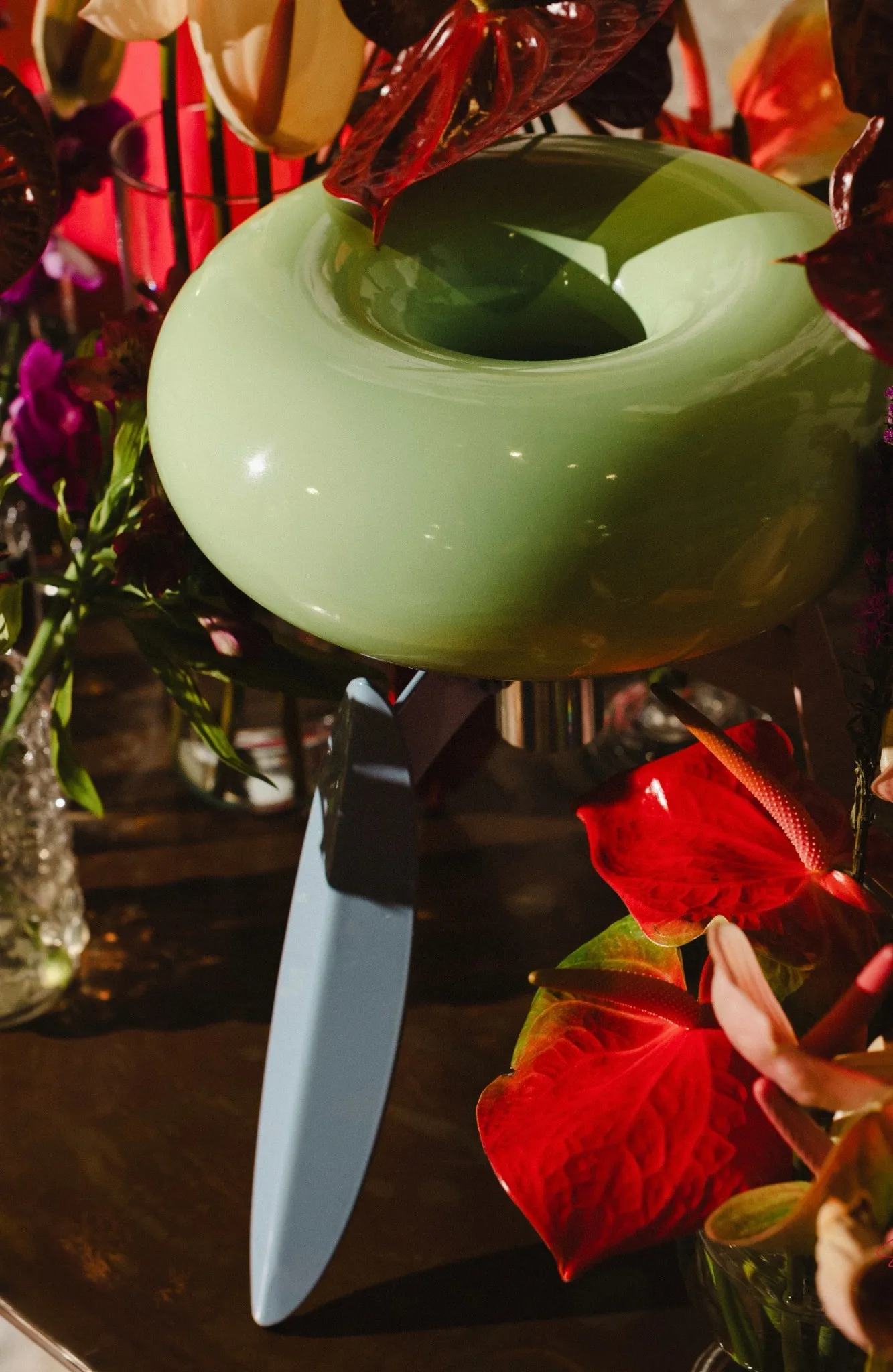 The Dot Nut's green seat among flowers
