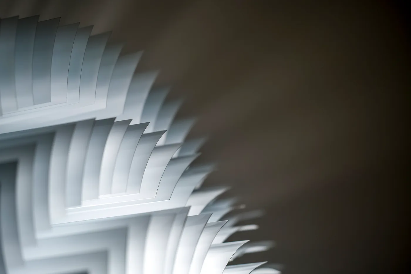 Detail of the wall lamp's chevron-folded slats