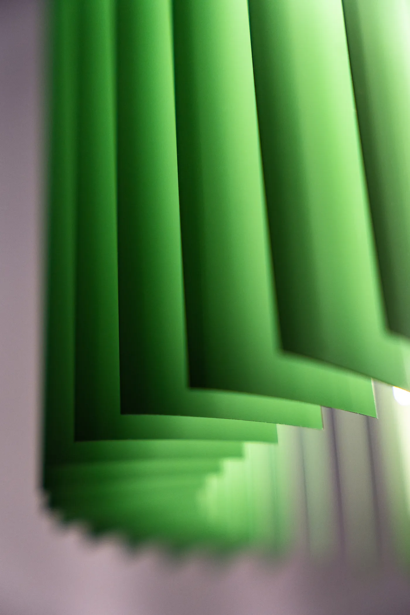 Detail of Keker's pleated reclaimed-blind body, lit from within