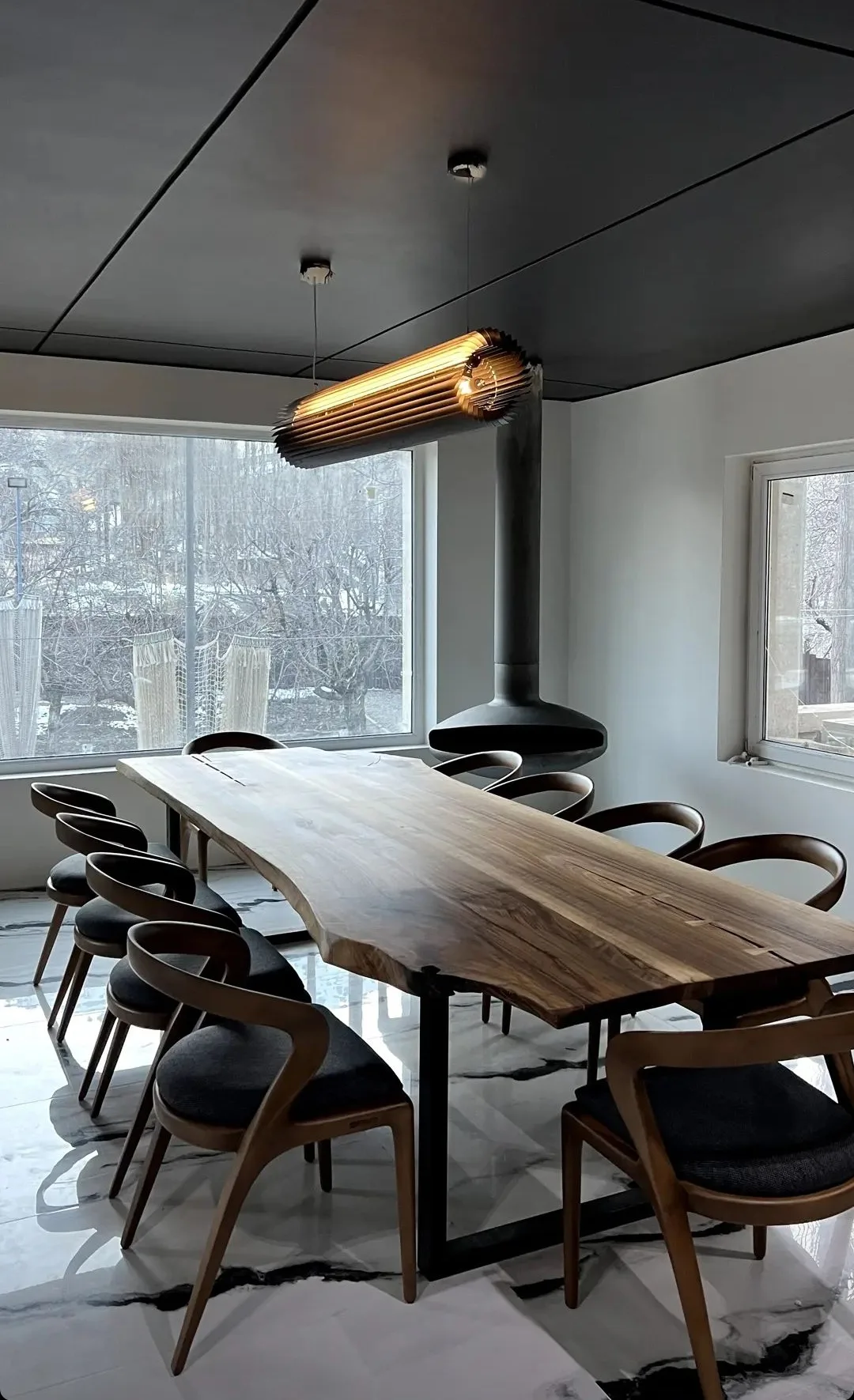 Keker in its horizontal configuration over a live-edge dining table